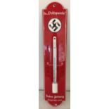 A WWII style German enamel shop thermometer advertising a German newspaper.