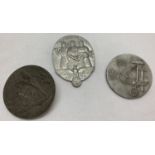 3 German WWII style tinny badges.