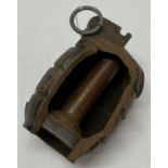 A WWII style Cut away inert No 36 Mills grenade.