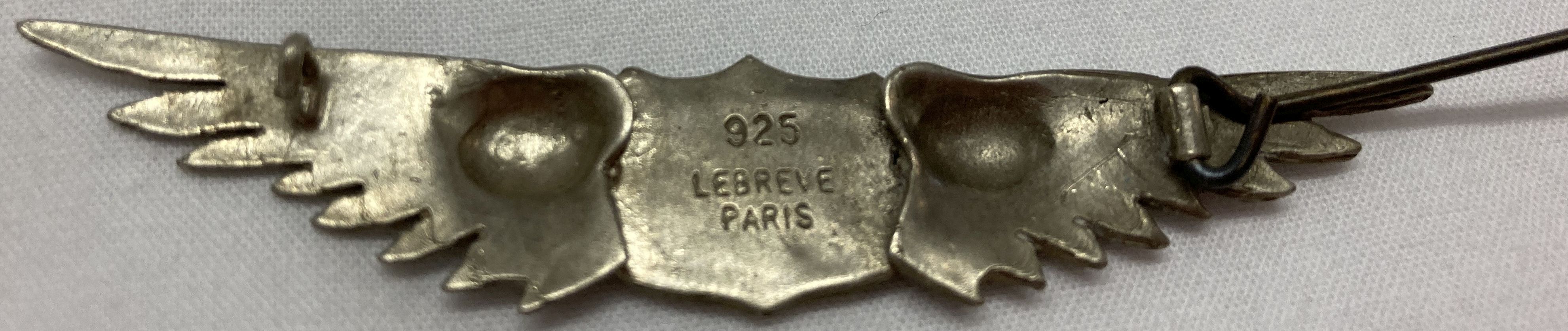 A WWI style silver US pilots wings badge. 'Made in Paris' impressed to reverse. - Image 2 of 2