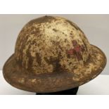 A WWI Somme barn find British medics "Brodie" helmet.