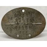 A WWI style Late War Imperial German dog tag.