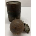 Vietnam war style inert US M-67 baseball grenade and transportation tube.