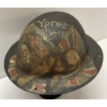 WWI style British "Brodie" helmet with post war hand painted artwork.