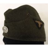 A WWII style SS-VT M34 overseas cap.