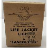 A boxed replica WWII RAF life vest.