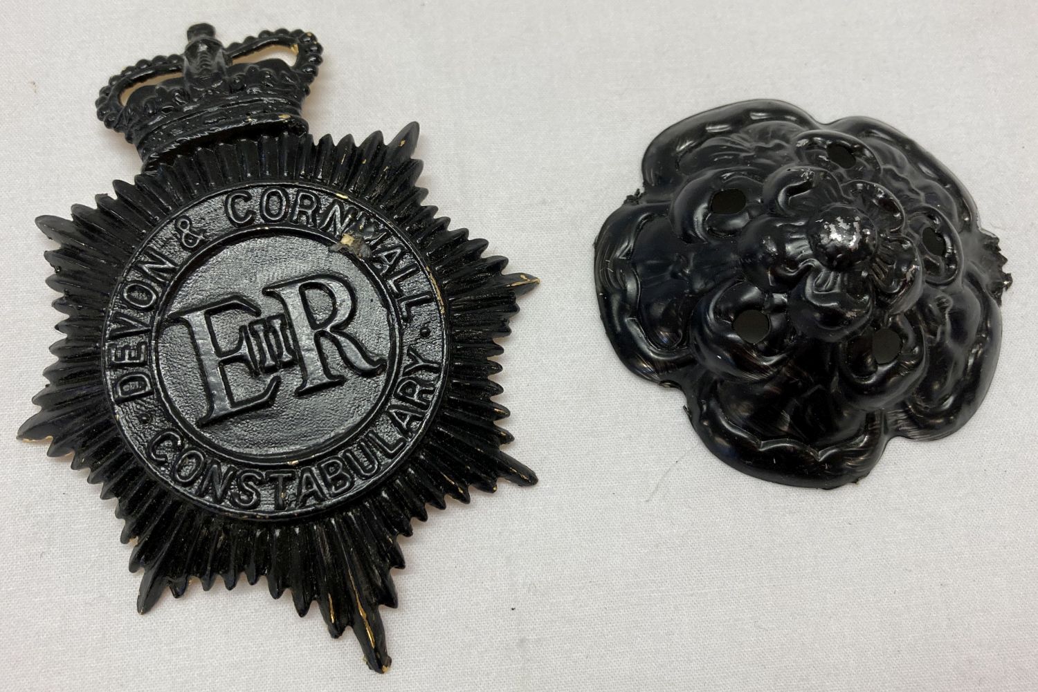 2 Devon & Cornwall constabulary helmet badges.