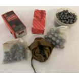 Approx. 30 x .375 calibre lead balls in a waxed bag together with 50 x .375 9.5mm lead balls,