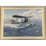 A framed oil on canvas of a vintage Royal Airforce Seaplane. Signed to bottom right Noel A Bray.