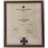 A WWII style framed and glazed Waffen SS Iron Cross first class EK1 and award certificate.