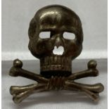 A German WWII style Brunswick Regiment Skull badge.