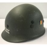 A Belgian M71 paratrooper helmet with hand painted decals to front and side.