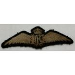 A WWI style Royal Flying Corps embroidered cloth wings badge.