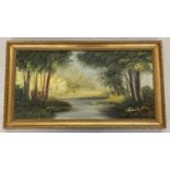 A gilt framed oil on canvas of a river scene. Indistinct signature to bottom right.