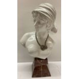 A large modern ceramic blanc de chine style bust of a lady.