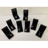 8 boxed natural stone pendant necklaces.