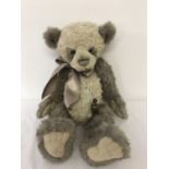 A large Charlie Bear "Paris" by Isabelle Lee. Fully jointed & weighted, in cream and grey colourway.