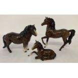 3 Royal Doulton ceramic horse figurines in brown gloss finish.