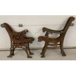 2 sets of wrought iron bench ends. Both have scroll work details.