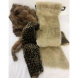 2 vintage fur stoles; one white, one brown together with a faux fur leopard print scarf.