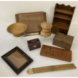 A box of assorted vintage wooden items.