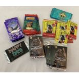 A quantity of 50 sealed and unopened assorted packs of trading cards.