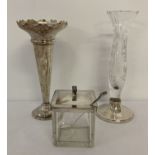 An Art Deco preserve pot together with a silver based crystal bud vase and a silver plated vase.