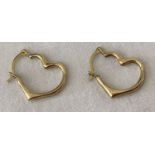 A pair of 9ct gold heart shaped hoop style earrings.