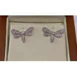 A pair of 18ct white gold and diamond set dragonfly stud style earrings, possibly Luke Stockley.