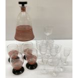 A collection of mid century glass ware to include decanter and 4 matching glasses.