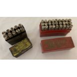 2 vintage cased sets of metal marking punches; one with letters and one with numbers.