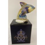 A boxed Royal Crown Derby Ltd Edition Guppy Fish ceramic paperweight with gold stopper.