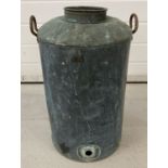 A vintage 2 handled cooper milk churn.