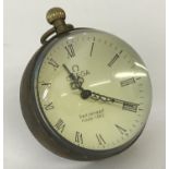 A small Omega design glass ball watch, bound in brass with roman numeral markers.