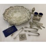 A collection of assorted silver plated items and cased commemorative coins.