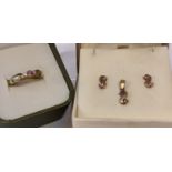 A 9ct gold diamond and pink sapphire matching dress ring, earrings and pendant.