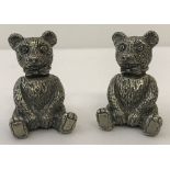 A vintage pewter teddy bear cruet set.