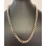 A heavy weight solid curb chain necklace with lobster style clasp. Approx. 20 inches long.