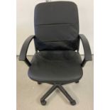 A black faux leather, height adjustable swivel office chair with arms.
