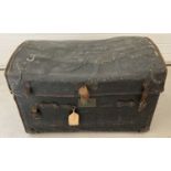 A large dome topped leather trunk with carry handles by B.Barrett Brothers, 426 Oxford Street West.