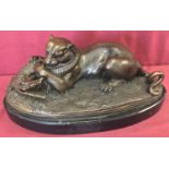 After Antoine-Louis Barye, a large figural bronze of a tiger fighting a crocodile.