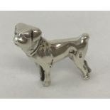 A miniature 925 silver figure of a dog.