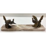 An Art Deco marble based mantle figurine/picture frame stand with figures of birds.
