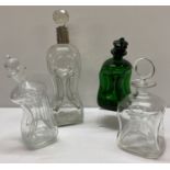 4 mid century Danish Holmegaard glass Kluk Kluk decanters.