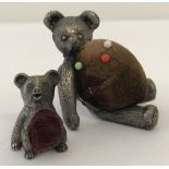 Two vintage pewter teddy bear pin cushion's.