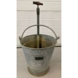 A vintage "Musto" galvanised stirrup pump bucket by W.T.French & Sons, Birmingham.