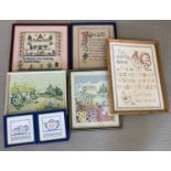 A quantity of framed embroideries and needlework pictures.
