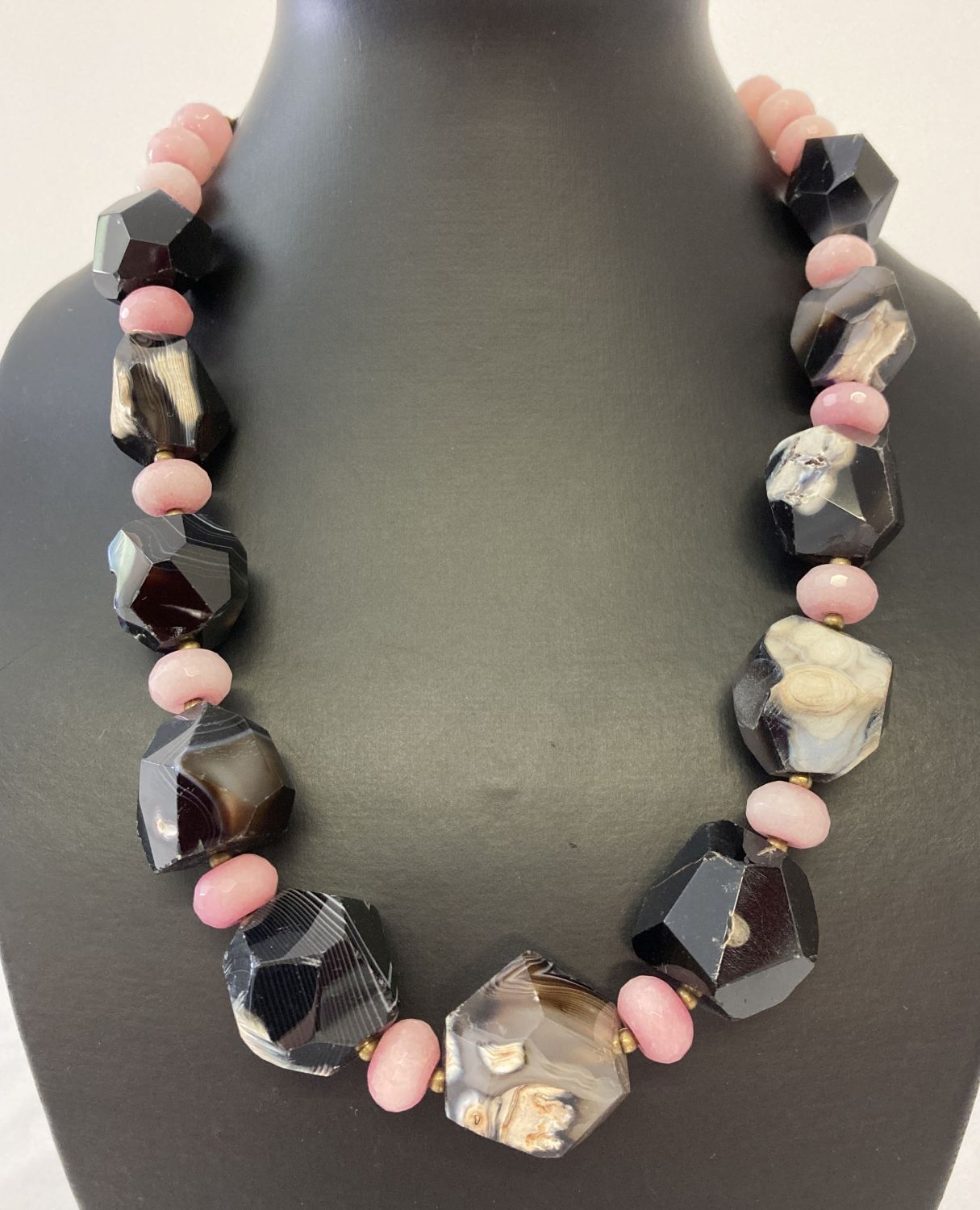 A natural stone statement necklace by Butler & Wilson.