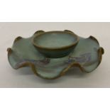 A Chinese porcelain 2 layer dish with shaped rim and splash effect to glaze.