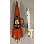 A vintage Minimax cone shaped fire extinguisher complete with wall hanging bracket.